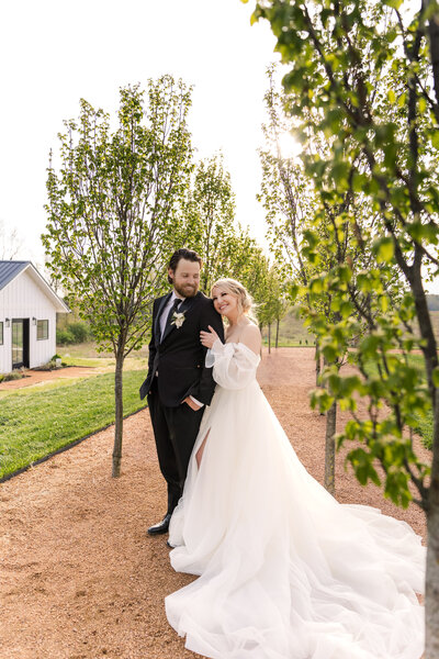 bride twirling holding grooms hand in reception space taken by Blak Marie, wedding photographer in Tampa