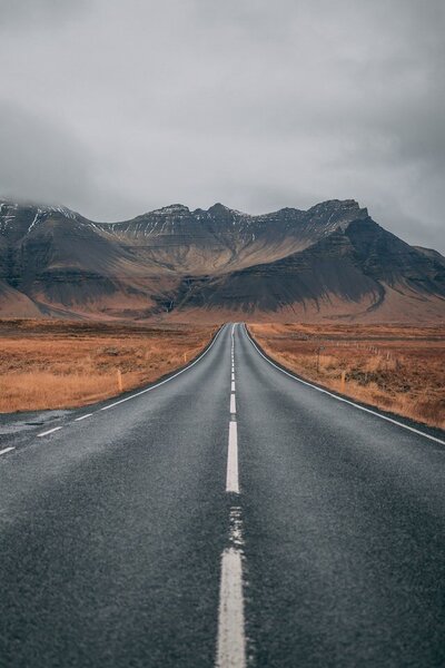 paved road into the mountains