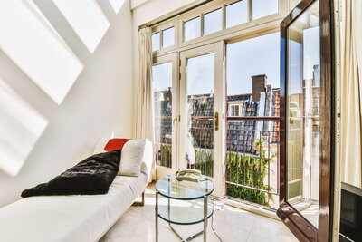 NYC apartment with a balcony offering scenic city views.