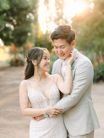 bride and groom romantic pose at hartley botanica wedding