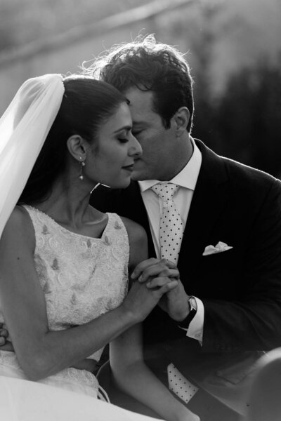 couple embracing black and white wedding photo
