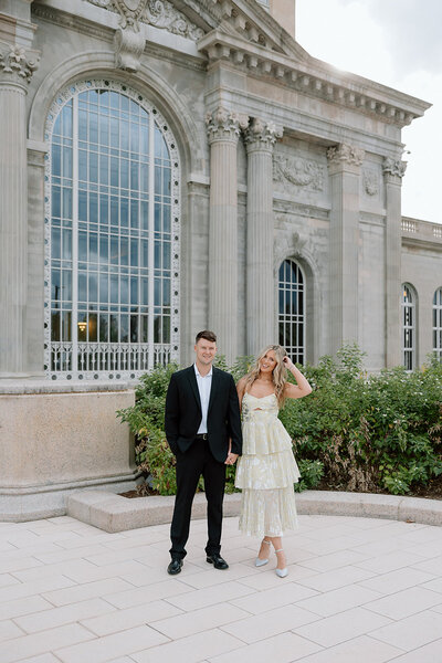 couple at the michigan central station for their engagement session