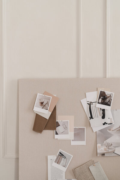 A creative mockup of a design strategy session with a female photographer seeking custom web design