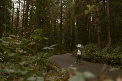 senior portrait in the forest near the oregon coast