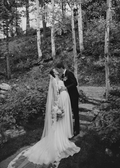 Bride and groom kissing at Blackstone Rivers Ranch wedding