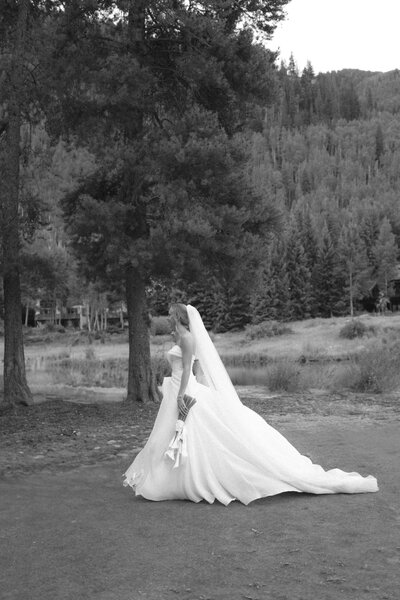 Close-up of bride’s luxury gown with cathedral veil | Vail wedding morning prep