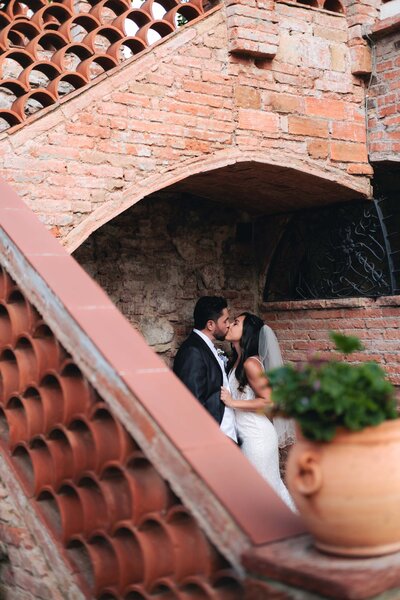 wedding couple kissing at Masia Can Borell
