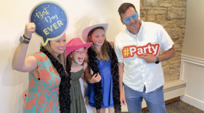 three girls wearing cowgirl hats and posing for a photo at a mitzvah party in Geneva, Illinois