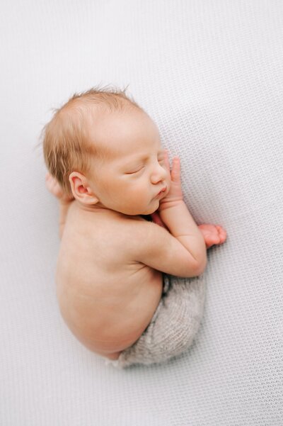 Adorable baby Photo by Ann Marshall of little boy smiling