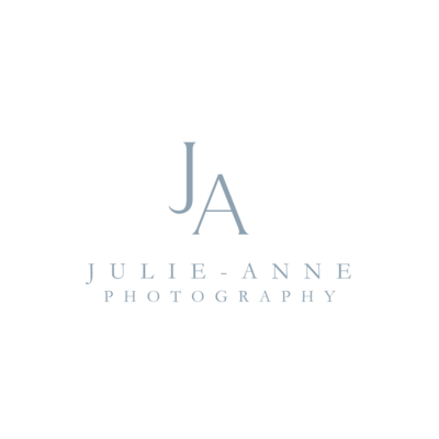 Logo for Julie-Anne Photography in light blue - large J and A over top of the words 'Julie-Anne Photography' in capitals.