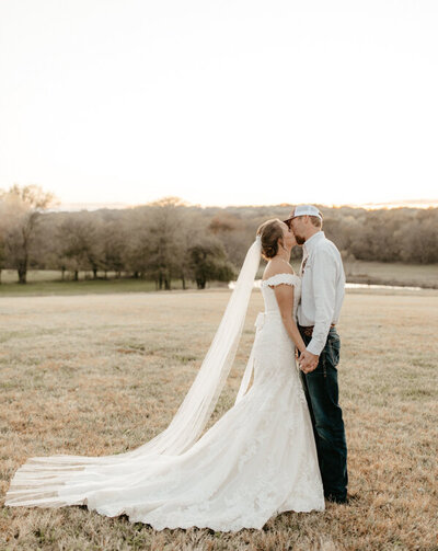 bride and groom kissing