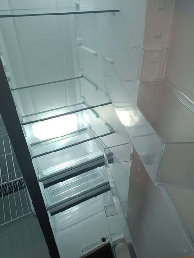 2 before and after refrigerator  by Rocket City Cleaning Crew