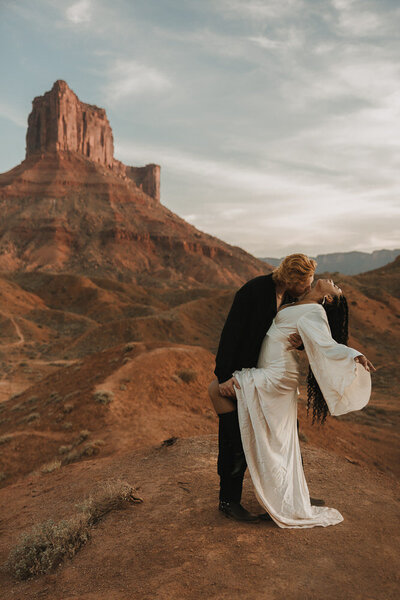 Bride and groom holding eachother