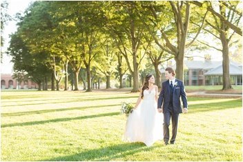 bride and groom walking at furman university