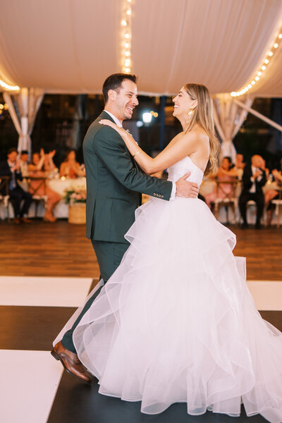 Bride and groom dancing on checkboard dance floor at Glen Foerd Estate in Philadelphia, PA