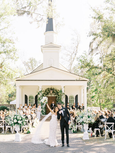 wedding ceremony outside sommerset chapel at montage palmetto bluff wedding venue
