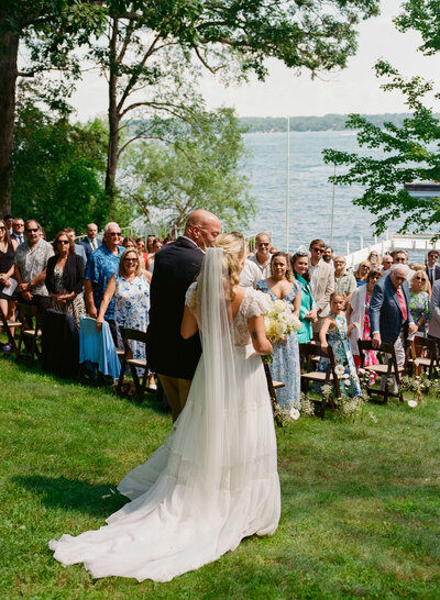 A summer wedding at a family home in Green Lake Wisconsin. Documented on 35mm film, 120 film, and Super 8mm Video.