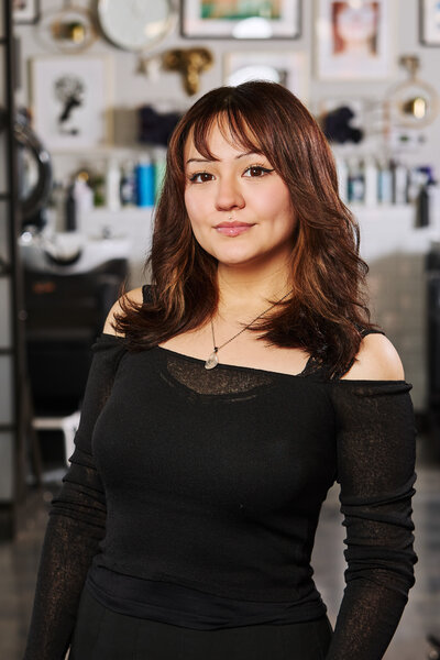 Headshot of Epoch Studio Salon's associate hair stylist, Angy