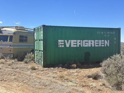Green family storage shipping container unit in New Mexico