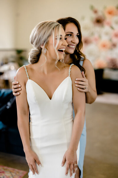 BRIDE AND MOM GETTING READY