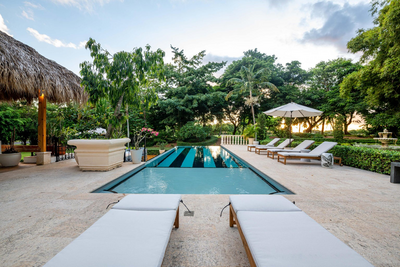Aerial view of white modern villas presented as curated property selections by Nova Lux DR Properties