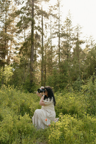 Brigette twirling outside in a white dress.