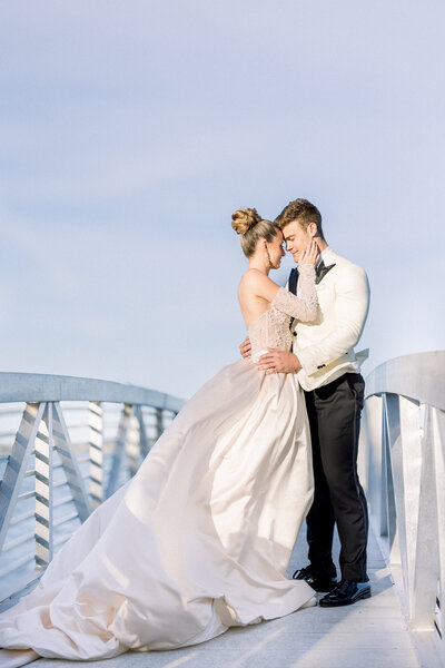 wedding couple on bridge at glen manor, in portsmouth RI