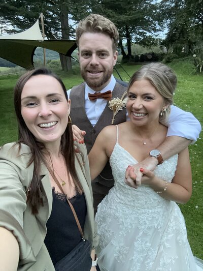 Amy & Nick posing with couple