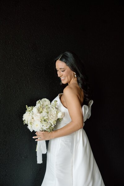 Modern Wedding at The Orchard Wedding Venue in wedding attire walking towards camera motion blur.