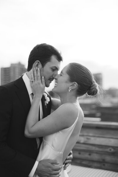 bride and groom kissing under veil elopement