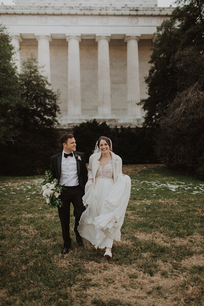 Couple poses for winter wedding in DC