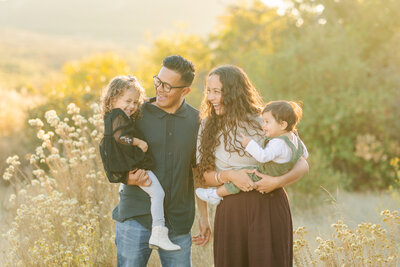 San Diego content creator, Makana Arvizu, with her husband and two kids at Lake Calavera in Vista, California.