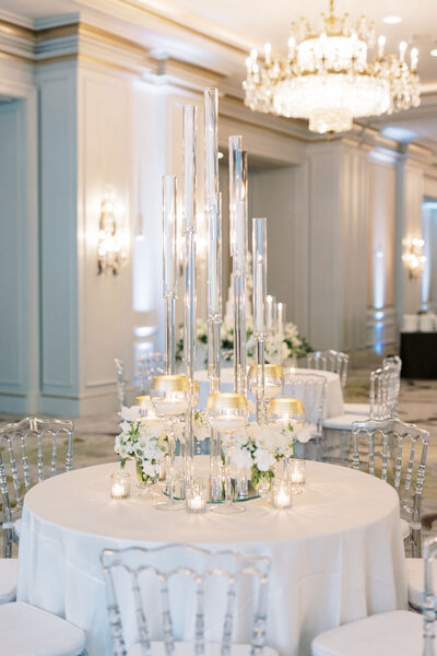 luxury reception design with white florals and candles