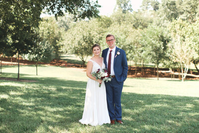 Bride and groom walk up memorial steps at their DC wedding