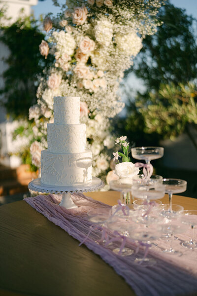 bride and groom romantic embrace during golden hour on top of the hill at cielo farms captured by malibu wedding photographer magnoli west
