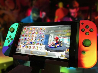 PPC optimization expert playing Nintendo with his daughter in front of a TV, showcasing a fun and engaging family activity.