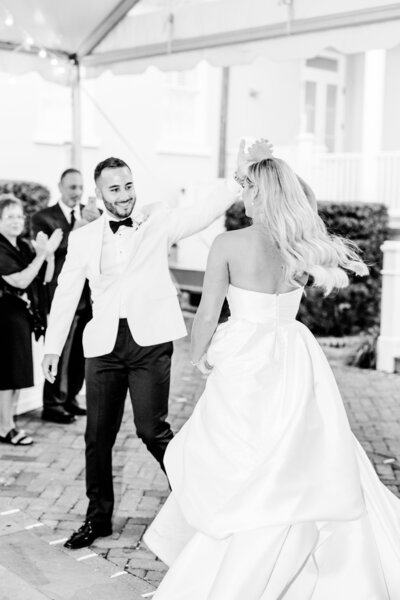 Groom spinning bride during their first dance at the Gadsden House