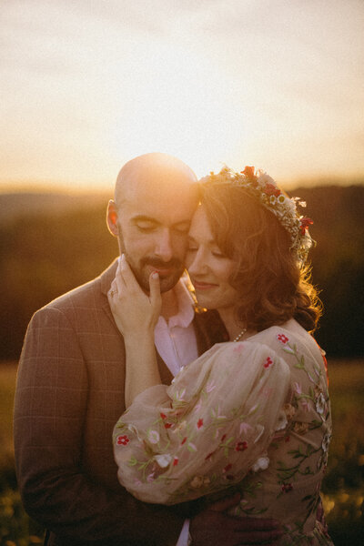 New England wedding couple at sunset
