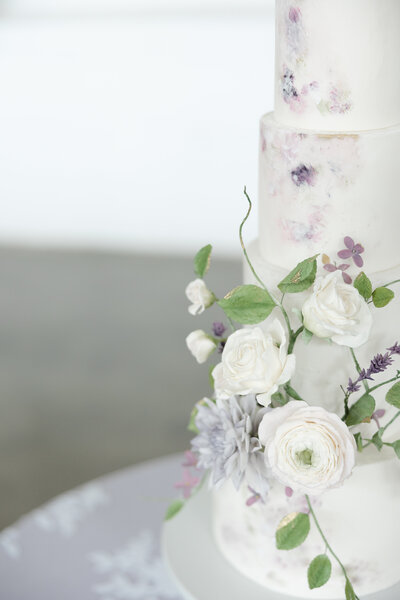 close up photo of wedding cake with floral details