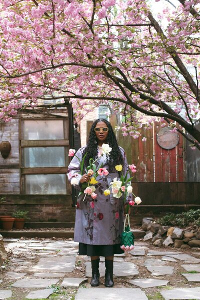 dries van noten floral coat portrait with tulips and camille albertine rose bouquet handbag