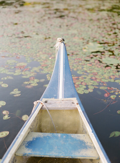 canoe on a lake at small business retreat in madison by brand photographer studio soma
