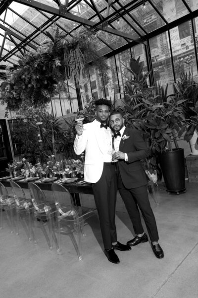 Two grooms reception portraits at their Tinsmith wedding with photos by Wanderlynn Photography