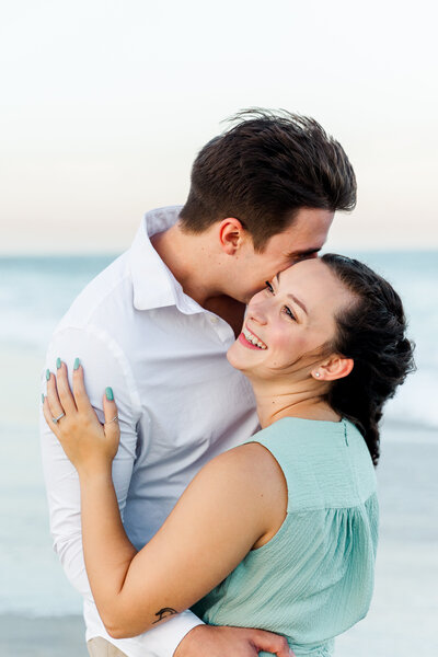 true-to-life, honest images of couple after engagement on the beach in Wrightsville, North Carolina.