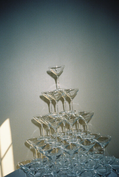 35mm film photograph of a champagne tower at a luxury wedding venue in austin texas 