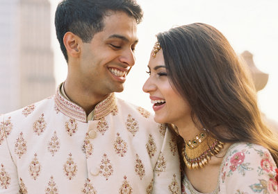 indian bride and groom smiling
