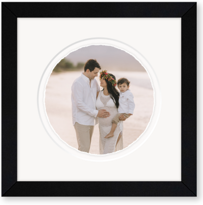 Framed image of a mom. dad, and toddler on the beach on Maui