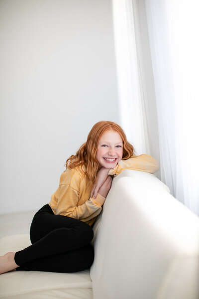 Tween girl smiling in photo studio in Boise.