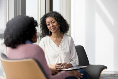 Engaged therapist, listening to client