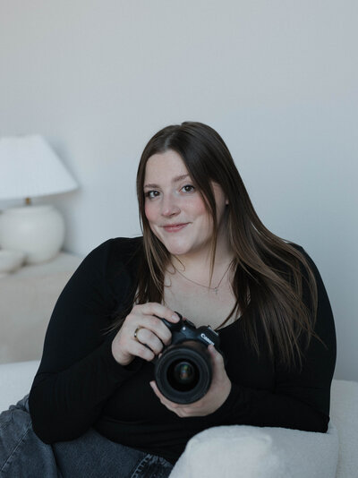 Branding portrait of an intimate wedding and elopement photographer specializing in candid, documentary-style, and vulnerable storytelling for couples wanting a laid-back and authentic experience. For couples planning intimate weddings and elopements.