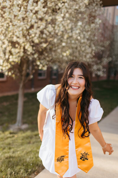 A spring college grad session at Wichita State University with Ashley Cole Photography